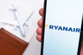 Ryanair Airlines mobile app. A convenient mobile application for buying tickets using smartphone with plane, passport