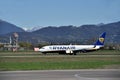 A Ryanair airplane on the airport runway in Bergamo International Airport.