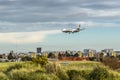 Lisbon PORTUGAL - 8 March 2020 - Ryanair airplane flying over low altitude to the area surrounding Humberto Delgado Airport before Royalty Free Stock Photo