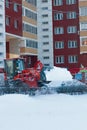RYAZAN, RUSSIA - DECEMBER, 15 - bulldozer cleaning street from snow on snowy winter.