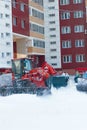 RYAZAN, RUSSIA - DECEMBER, 15, 2016 - bulldozer cleaning street from snow on snowy winter.