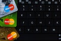 Ryazan, Russia - February 27, 2018: Few credit cards of Mastercard company over the black computer keyboard. Royalty Free Stock Photo