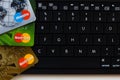 Ryazan, Russia - February 27, 2018: Few credit cards of Mastercard company over the black computer keyboard. Royalty Free Stock Photo