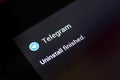 Ryazan, Russia - May 03, 2018: Uninstall Telegram app message window on the display of tablet PC.