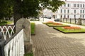 Rybinsk, Russia - July 15, 2020: Public park in the business part of the city, the trunk of an old linden tree against the