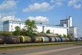 RYBINSK, RUSSIA.  Freight train with tanks on the background of a grain elevator. Yaroslavl region Royalty Free Stock Photo