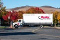 Ryder truck crossing the street. Ryder System, Inc. is an American provider of transportation and supply chain management products