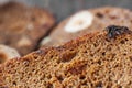 Rye bread background, slices with nuts and raisins Royalty Free Stock Photo