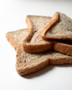 three slices of wheat bread on a white background Royalty Free Stock Photo