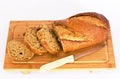 Rye bread with cereals on wooden table. Isolated Royalty Free Stock Photo