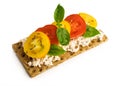 Rye bread with cheese, tomatoes, basil and thyme