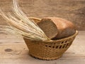 rye bread and ears of corn in basket Royalty Free Stock Photo