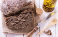 Rye bread over white wooden background Royalty Free Stock Photo