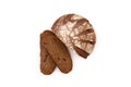 Rye bread round loaf cut into pieces on a white background Royalty Free Stock Photo