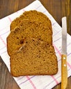 Rye bread slices with a knife on a napkin Royalty Free Stock Photo
