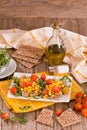 Rye bread with sweet  corn, basil and tomato. Royalty Free Stock Photo