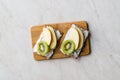 Rye Cripsbread with Cream Cheese, Apple Slices and Kiwi Fruit / Healthy Snacks Recipe