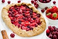 Rye dough galeta pie with fresh strawberry, cherry and blackberry Royalty Free Stock Photo