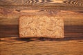 Rye home-made bread with sesame on the wooden table Royalty Free Stock Photo