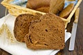 Rye homemade bread with ears on board Royalty Free Stock Photo