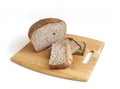 Rye and wheat bread. A piece of bread. A loaf of bread on a cutting board. Isolated image. Food Royalty Free Stock Photo