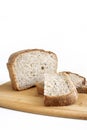 Rye and wheat bread. A piece of bread. A loaf of bread on a cutting board. Isolated image. Food Royalty Free Stock Photo