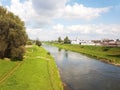 Rzeszow, Poland: city promenade. Wislock river on a summer sunny day. Park for walking citizens with a racetrack. Walk outdoors.