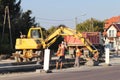 Rzeszow, Poland - 10 9, 2018: The excavator submits construction debris to a truck. Cleaning the site for new construction.