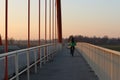 Rzeszow, Poland - 9 9 2018: Suspended road bridge across the autobahn. Metal construction technological structure. Modern