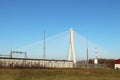 Rzeszow, Poland - 9 9 2018: Suspended road bridge across the Wislok River. Metal construction technological structure. Modern arch Royalty Free Stock Photo