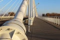 Rzeszow, Poland - 9 9 2018: Suspended road bridge across the Wislok River. Metal construction technological structure. Modern arch