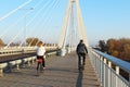 Rzeszow, Poland - 9 9 2018: Suspended road bridge across the Wislok River. Metal construction technological structure. Modern arch