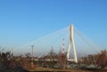 Rzeszow, Poland - 9 9 2018: Suspended road bridge across the Wislok River. Metal construction technological structure. Modern arch Royalty Free Stock Photo