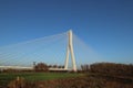 Rzeszow, Poland - 9 9 2018: Suspended road bridge across the Wislok River. Metal construction technological structure. Modern