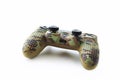 RZHEV, RUSSIA - May 16, 2021: New Sony Dualshock 4 for PlayStation 4 in a camouflage case on a white background Royalty Free Stock Photo