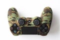 RZHEV, RUSSIA - May 16, 2021: New Sony Dualshock 4 for PlayStation 4 in a camouflage case on a white background Royalty Free Stock Photo