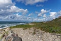 RÃÂ¥geleje Strand Blick nach Gilleleje im Hintergrund die KÃÂ¼ste von Schweden, Seeland, DÃÂ¤nemark Royalty Free Stock Photo