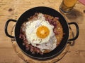 RÃÂ¶sti with fried egg and bacon Royalty Free Stock Photo