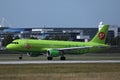 S7 Airlines jet taxiing on runway