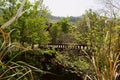 1970s` arch bridge in deserted factory