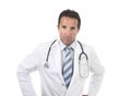 40s attractive male medicine doctor with stethoscope wearing medical gown in worried and stress Royalty Free Stock Photo