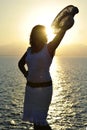 40s attractive woman Silhouette beach sunset in front of the sea Royalty Free Stock Photo