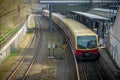 S bahn or suburban trains in Berlin, Germany. Modern red and yellow train for commuting purposes, on station of Messe Sud on a