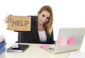 40s businesswoman holding help sign working desparate suffering