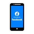 Facebook logo follow us on mobile screen Royalty Free Stock Photo