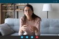 Woman videoconferencing app user talking with friend by video call