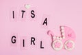 It`s a girl pink card. Newborn background. Baby shower invitation. Birth announcement. Flat lay