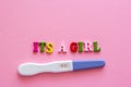 It`s a girl words, positive pregnancy test Royalty Free Stock Photo