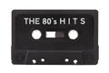 The 80s hits, old vintage 80`s audio, hit songs compilation, retro mixtape, black tape audio cassette object isolated on white Royalty Free Stock Photo