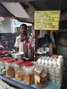 It`s an Indian poor foot tea shop, where the guy sells tea, biscuits, eggs.